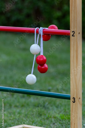 Game of ladder golf set up outdoors in a garden