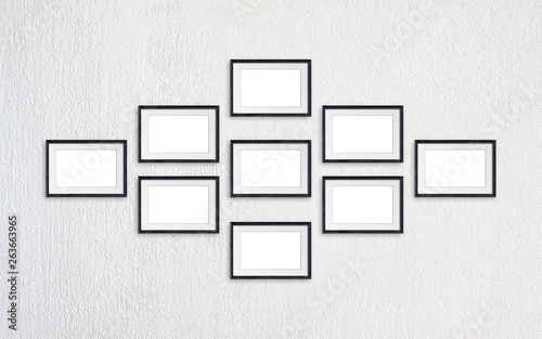 Photo frames collage, nine black realistic wooden frameworks isolated on white plastered wall, interior decor mock up