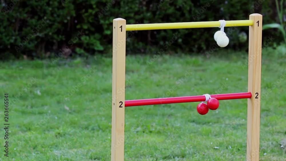 Game of ladder golf being played outdoors Game of ladder golf being played outdoors