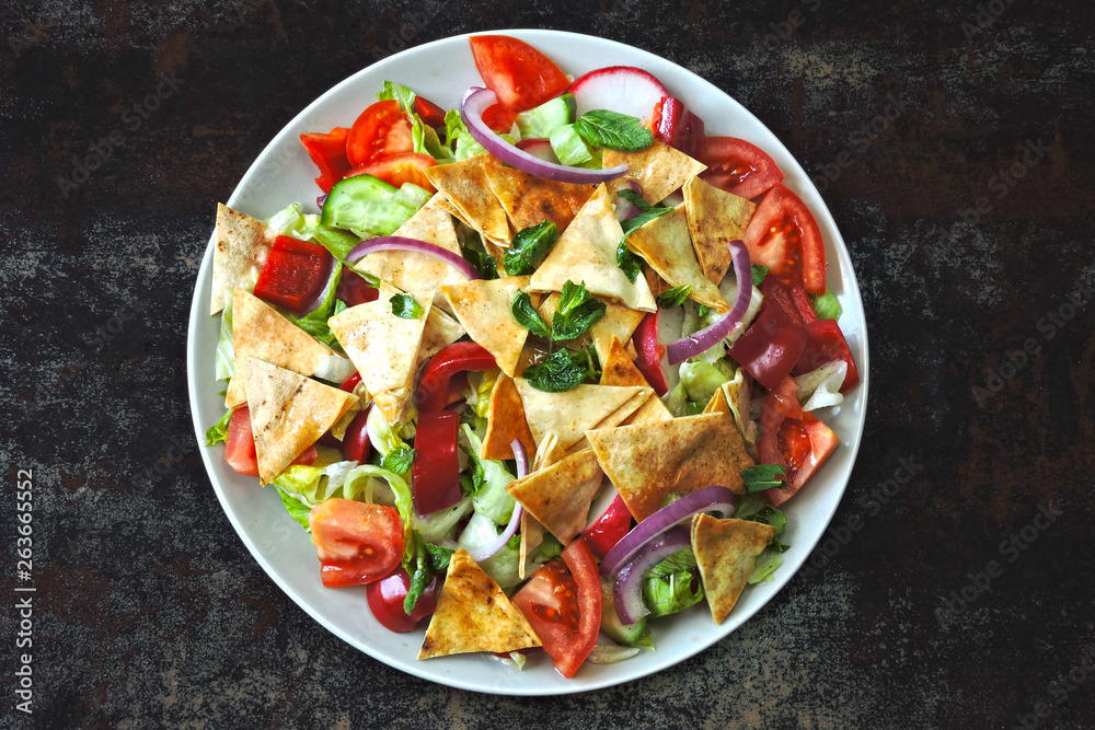 Middle Eastern salad with pita bread and vegetables. Fattush Salad.