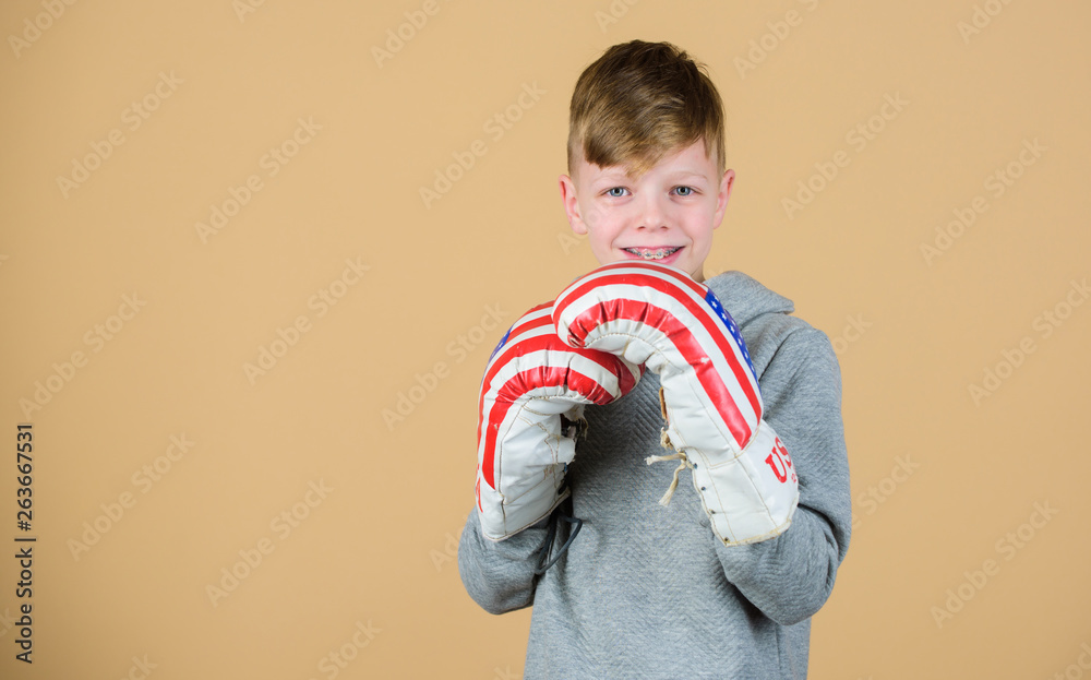 usa independence day. Happy child sportsman in boxing gloves. Fitness diet. energy health. workout of small boy boxer. punching knockout. Working his core muscles. Sport success. sportswear fashion usa independence day. Happy child sportsman in boxing gloves. Fitness diet. energy health. workout of small boy boxer. punching knockout. Working his core muscles. Sport success. sportswear fashion