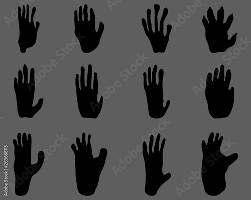 Black footprints of monkey on a gray background