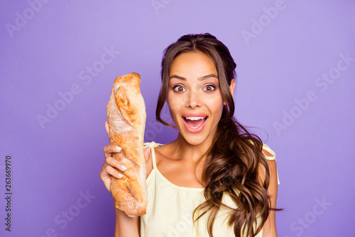 Closeup photo portrait of funny funky charming nice glad positive she her lady holding long white with cereal in hand isolated violet background