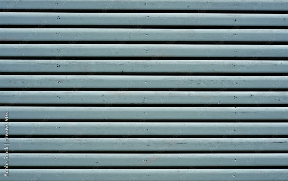Piece of shed wall with old - weathered blue paint. Piece of shed wall with old - weathered blue paint.
