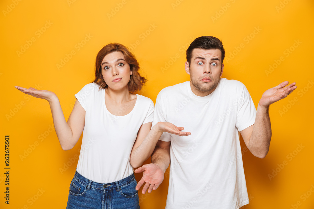 Portrait of a cheerful young couple standing