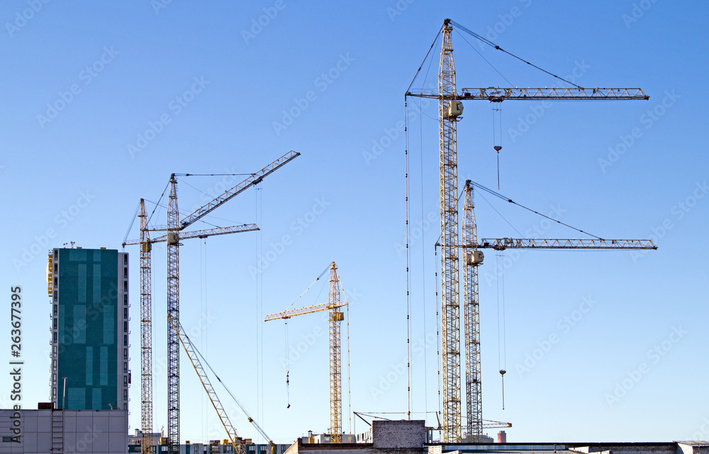 cranes on construction site cranes on construction site