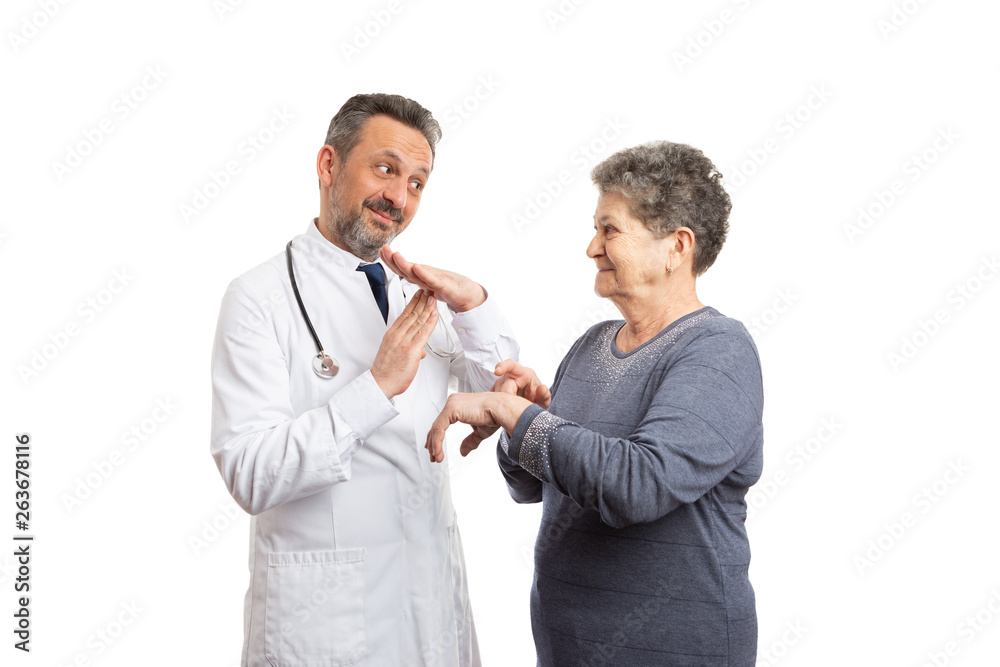 Doctor making break-time gesture while patient points at wrist Doctor making break-time gesture while patient points at wrist