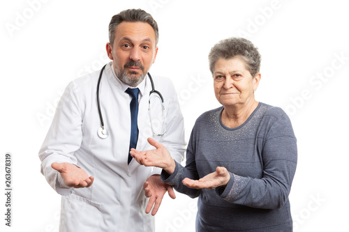 Doctor and patient making confused gesture