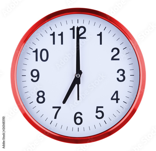 Wall clock isolated on white background. Seven oclock