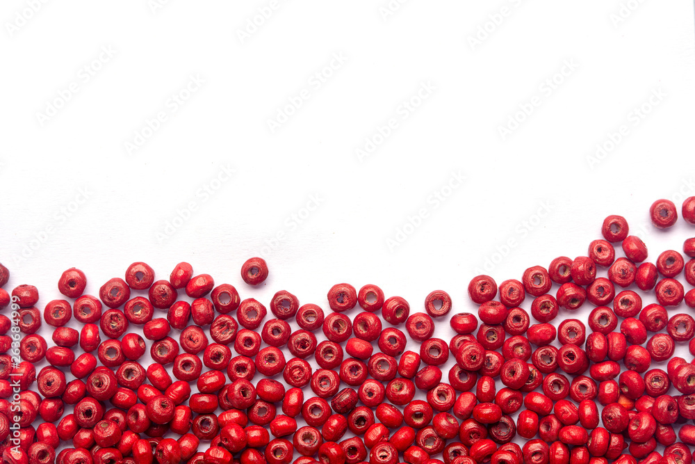 abstract beautiful red colors wooden beads on white background abstract beautiful red colors wooden beads on white background