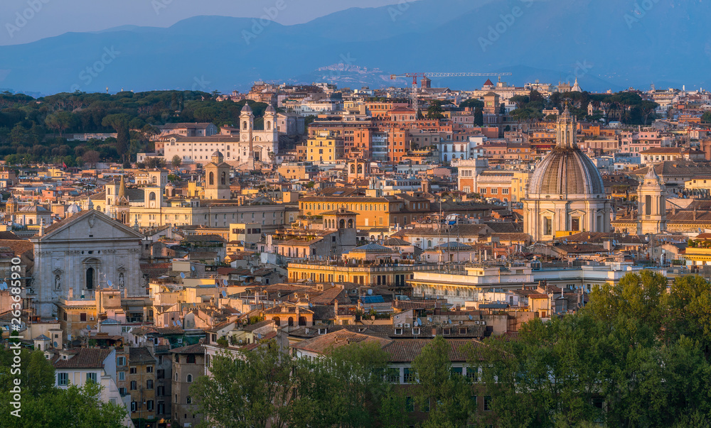 Late afternoon panorama with Trinità dei Monti from the Gianicolo Terrace in Rome, Italy.