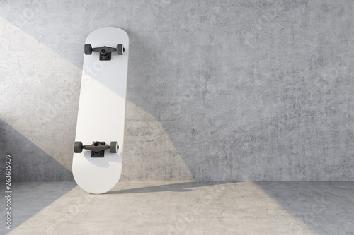 white skateboard on concrete wall background