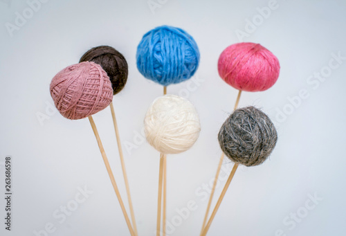 Multicolored balls of wool yarn for knitting