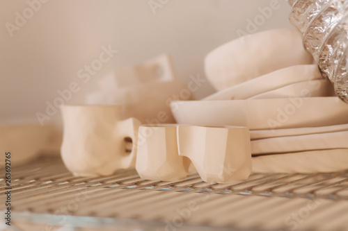 Fototapeta Naklejka Na Ścianę i Meble -  Dishes made of ceramics. Cups, mugs and cutlery
