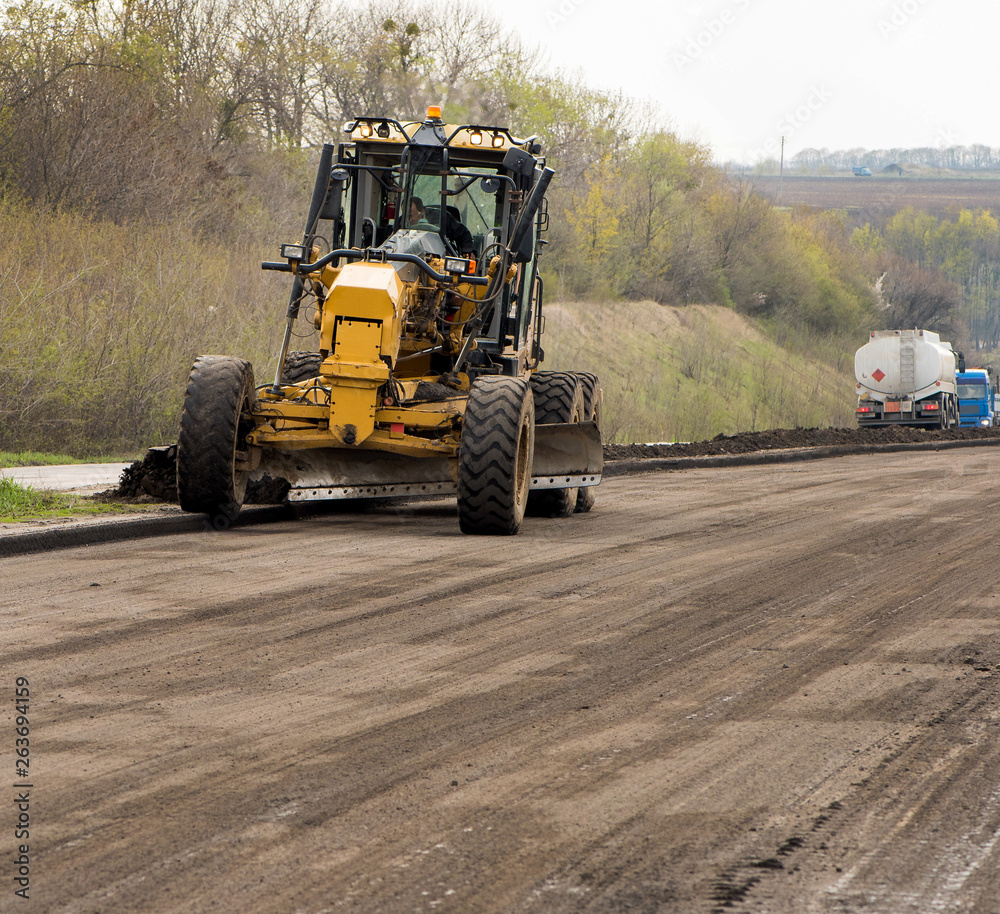 Heavy machinery on the construction of a new road. Heavy machinery on the construction of a new road.