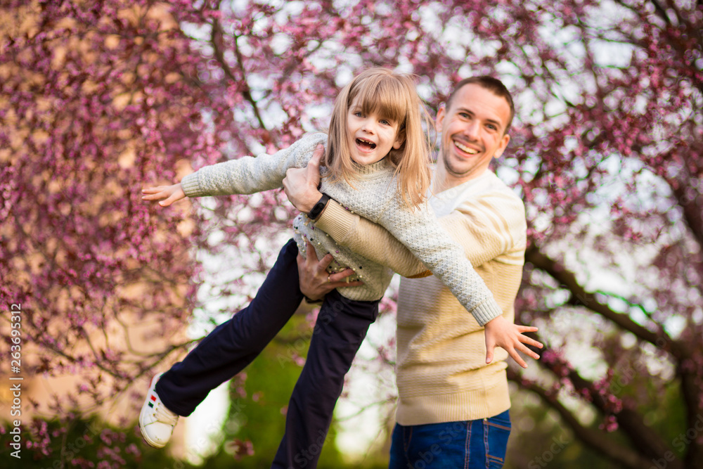 Happy father and child spending time outdoors Happy father and child spending time outdoors