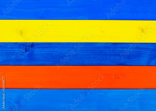 Brightly painted wood, in natural beach holiday design or vacation style, as wooden backgrounds.