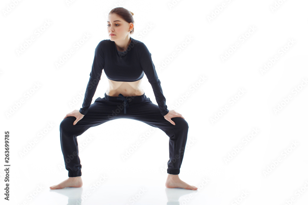 A woman makes a stomach vacuum. A woman makes a stomach vacuum.