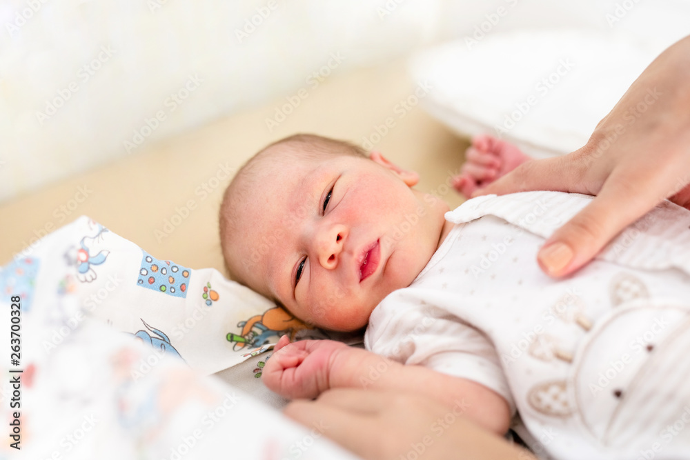 Newborn baby. Little child in medicine hospital. Medical health care. Doctor pediatrician. Small kid, infant in clinic. Healthy little kid shortly after birth Newborn baby. Little child in medicine hospital. Medical health care. Doctor pediatrician. Small kid, infant in clinic. Healthy little kid shortly after birth