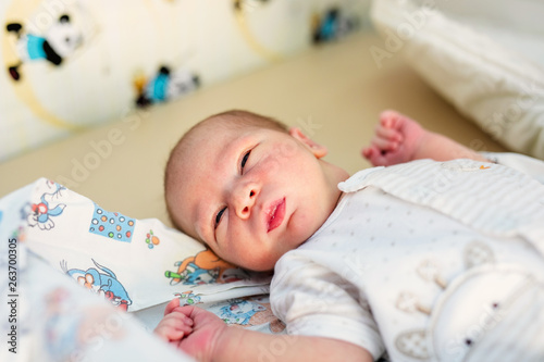 Newborn baby. Little child in medicine hospital. Medical health care. Doctor pediatrician. Small kid, infant in clinic. Healthy little kid shortly after birth
