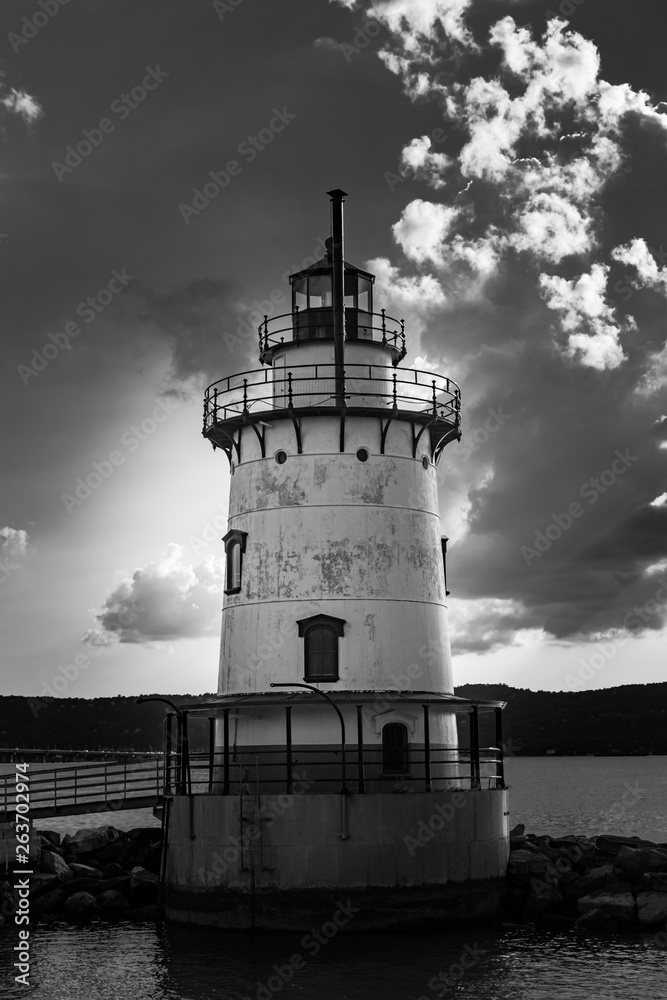 Sleepy Hollow Lighthouse back-lit by the sun, with sky and clouds in the background, in black & white, Sleepy Hollow, Upstate New York, NY