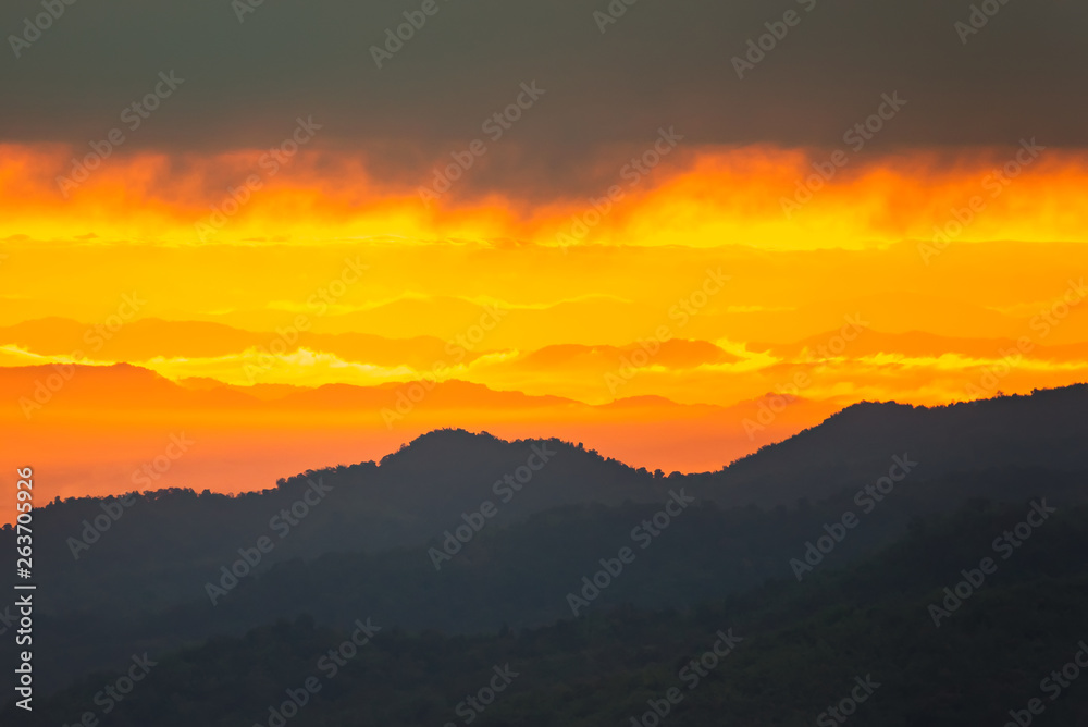 Obraz premium Sunrise.Mountain valley during sunrise. Natural summer landscape.Lighting before sunrise at the morning time.Thailand.