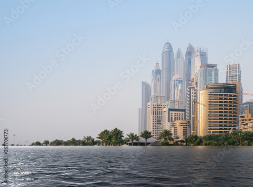 Canvas Print Digital composite of flooded beach at Jumeirah beach in Dubai Marina, UAE