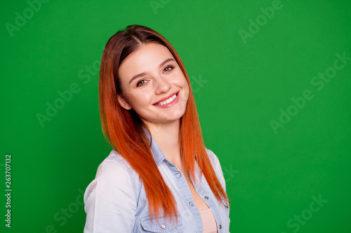 Close up side profile photo beautiful amazing crazy she her foxy lady sincerely look toothy beaming smile pretty attractive affectionate wear casual jeans denim shirt isolated green bright background