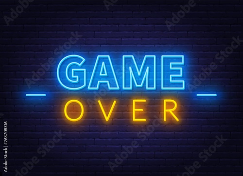 Neon game over sign on brick wall background. Vector illustration