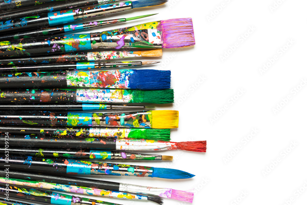 Set of stained paintbrushes isolated on white. Artistic background Set of stained paintbrushes isolated on white. Artistic background