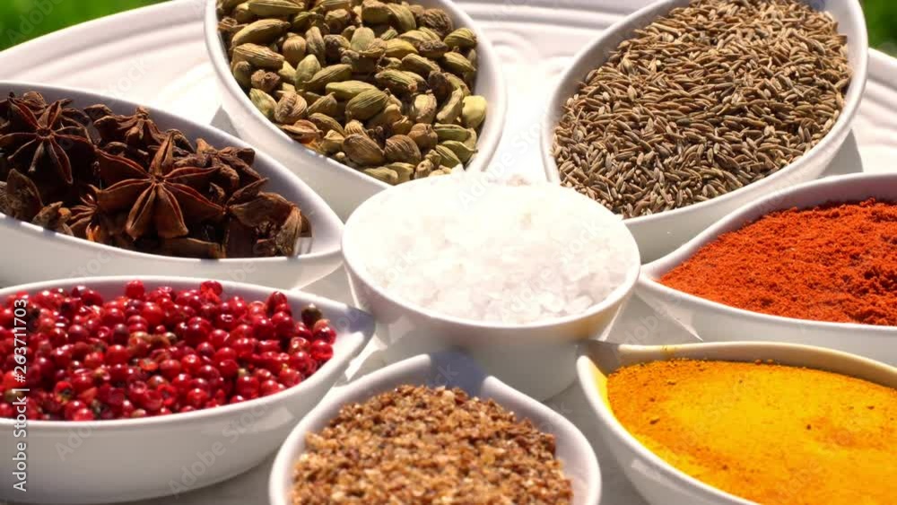 Spices. Various Indian. Spice and herbs rotate. Assortment of Seasonings, condiments. Cooking ingredients, flavor. 4K video Beautiful view Spices. Various Indian. Spice and herbs rotate. Assortment of Seasonings, condiments. Cooking ingredients, flavor. 4K video Beautiful view
