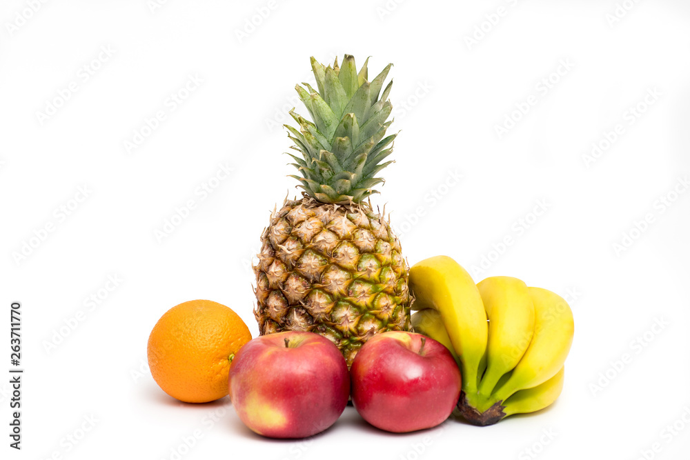 various fruits on a table on a white background various fruits on a table on a white background