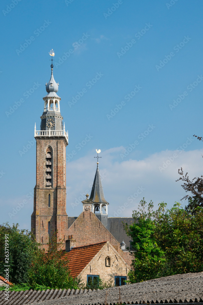 Sint Bavo Church in Aardenburg, The Netherlands. Blue sky, space for text