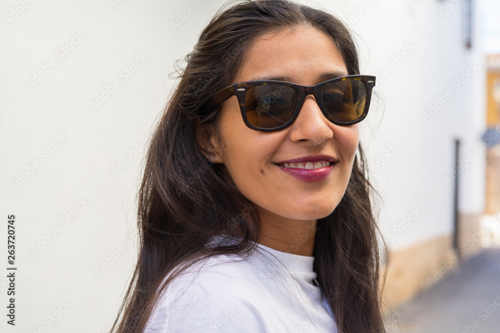 Young indian woman laughing and happy