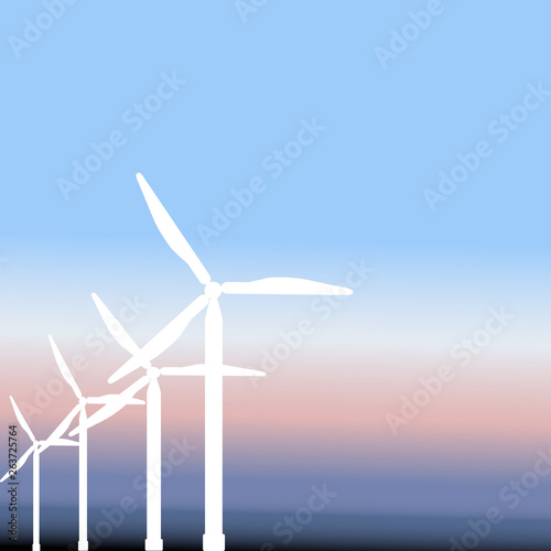Wind energy, the silhouette of the turbine, the sky and the space for the text