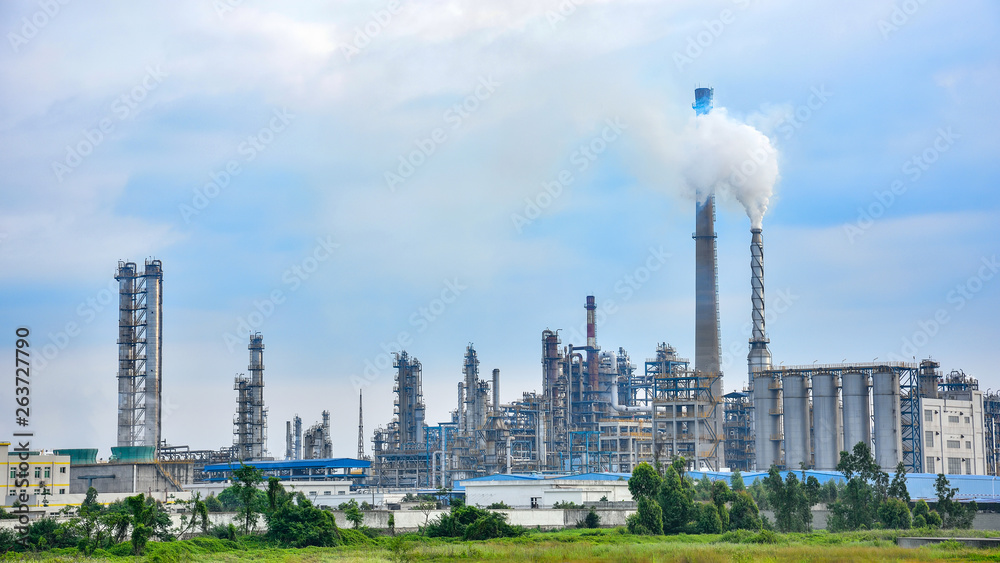 Refinery plant under the background of blue sky white clouds Refinery plant under the background of blue sky white clouds