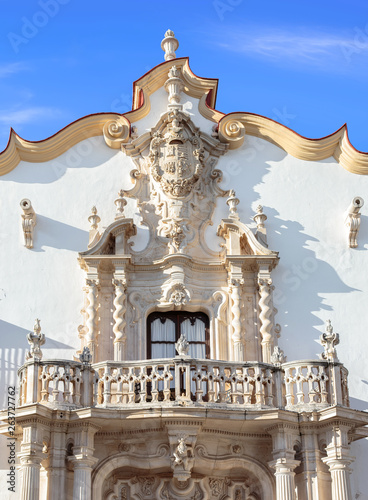 Baroque facade of the Marques de la Gomera Palace in Osuna. Ducal town declared a Historic-Artistic Site. Southern Spain. Picturesque travel destination on spain. photo