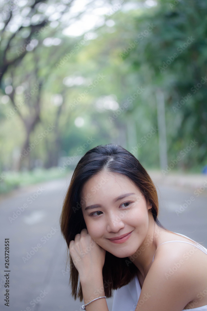 Portrait of thai adult beautiful girl relax and smile Portrait of thai adult beautiful girl relax and smile