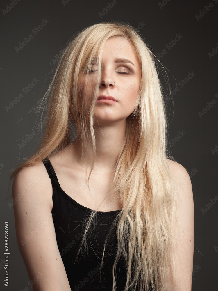 Attractive young woman with beautiful blonde hair Attractive young woman with beautiful blonde hair