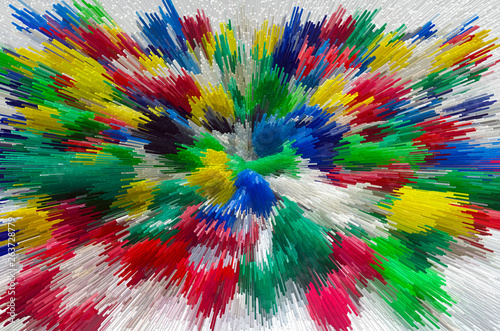 "Explosion" of multi-colored stationery buttons on a white background