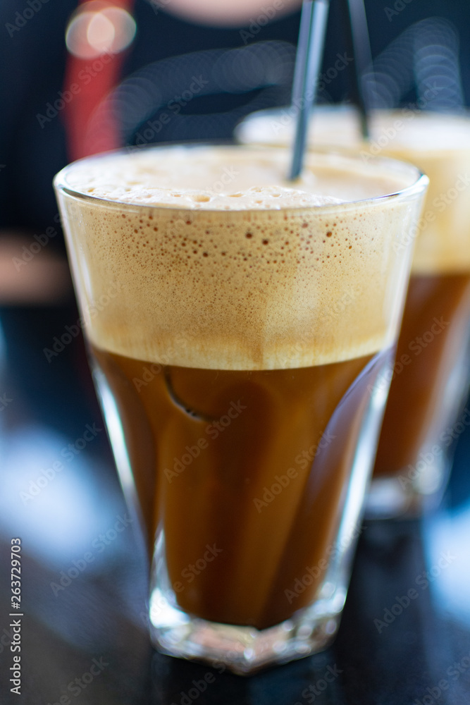 Traditional greek cold coffee Frappe made from water, instant coffee and ice cubes Traditional greek cold coffee Frappe made from water, instant coffee and ice cubes