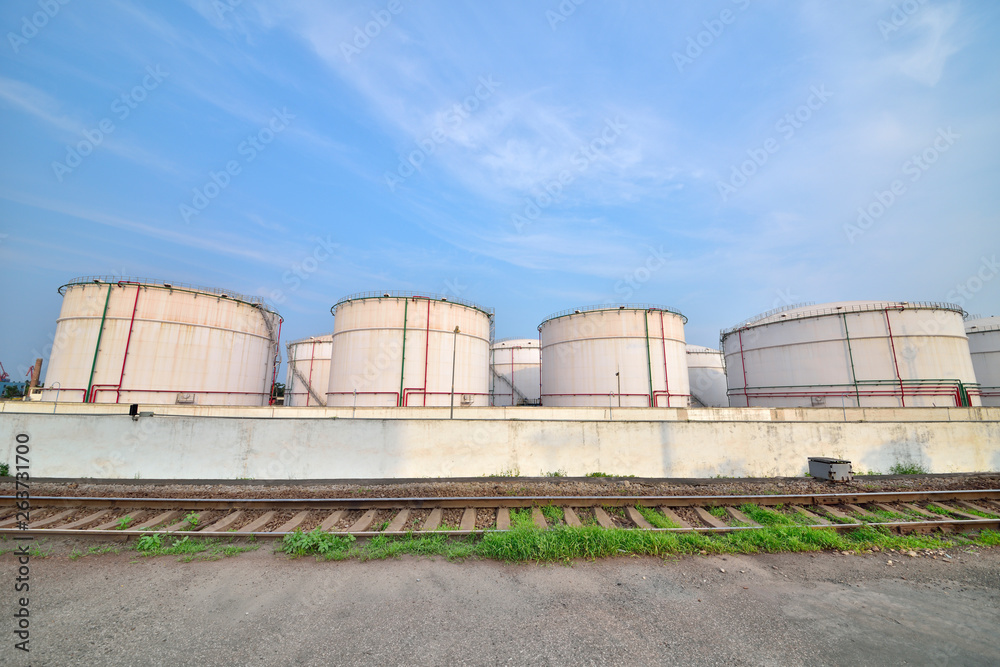Big white gasoline and oil industry background of railway transportation of storage tanks Big white gasoline and oil industry background of railway transportation of storage tanks