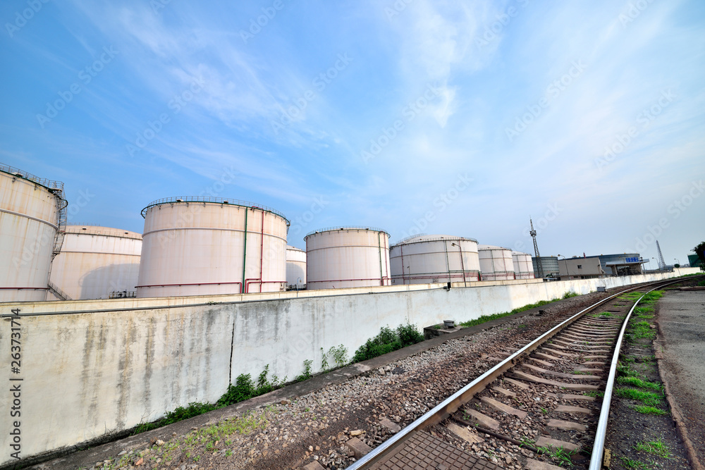 Big white gasoline and oil industry background of railway transportation of storage tanks Big white gasoline and oil industry background of railway transportation of storage tanks