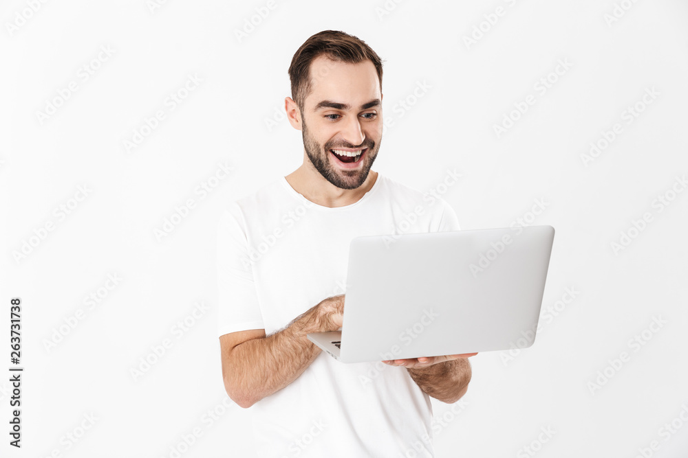 Handsome cheerful man wearing blank t-shirt Handsome cheerful man wearing blank t-shirt