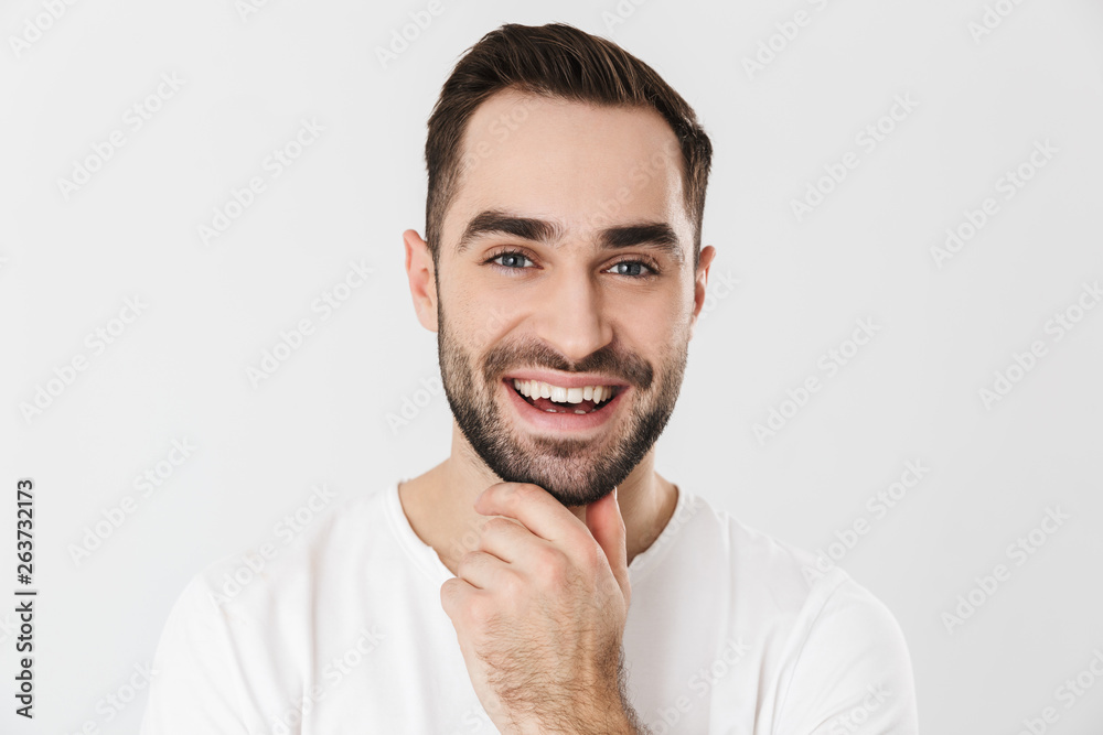 Handsome cheerful man wearing blank t-shirt