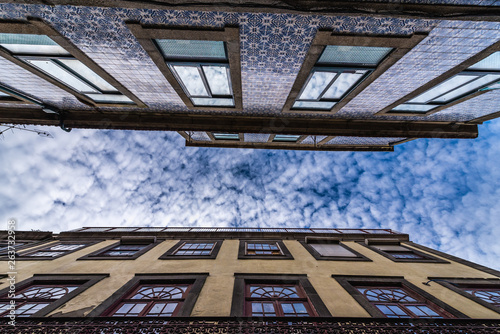 Residential buildings with tiled facades on Rua do Pinheiro in Porto, Portugal photo