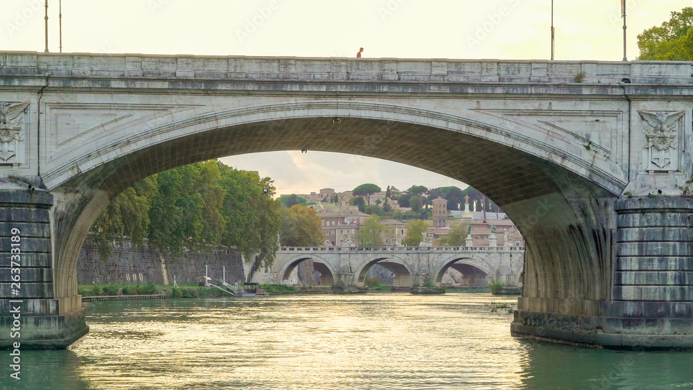 16956_The_archs_of_the_bridge_in_Tiber_river_in_Rome_Italy.jpg