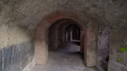 17239_The_dark_tunnel_under_the_ampitheatre_in_Pompeii_Italy.jpg