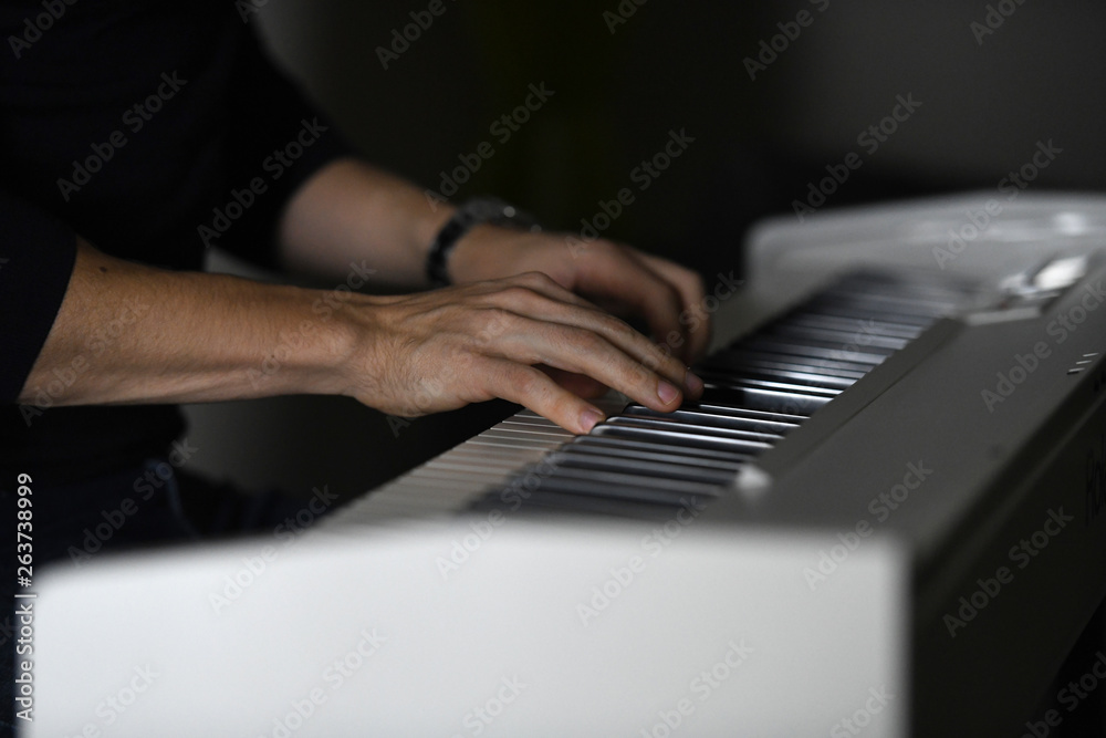 Fototapeta premium Pianist playing piano