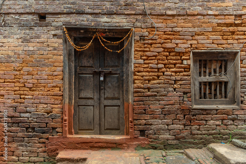 Old plain newari style door and window photo